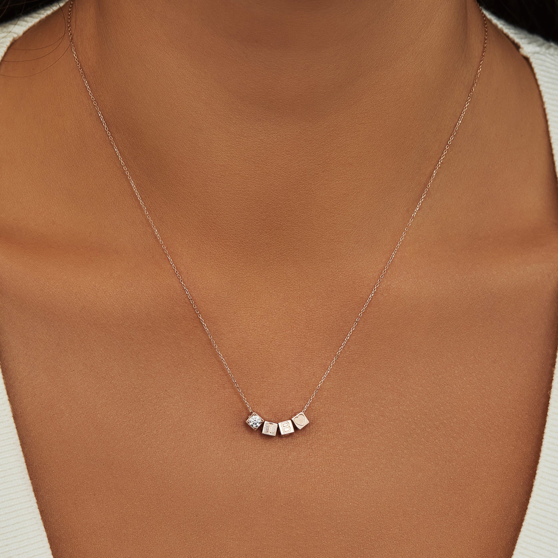 Isabel Bernard La Concorde Felie 14 Carat Rosegold cube Charm IB350049